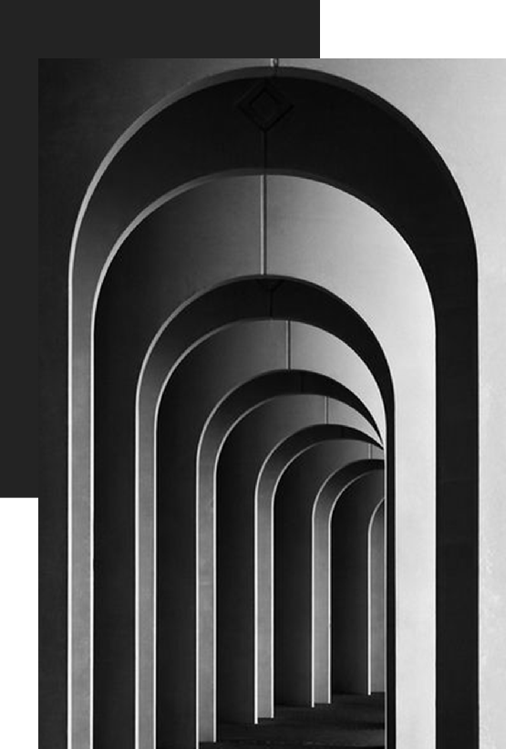 Symmetrical arches creating a rhythmic pattern in black and white.