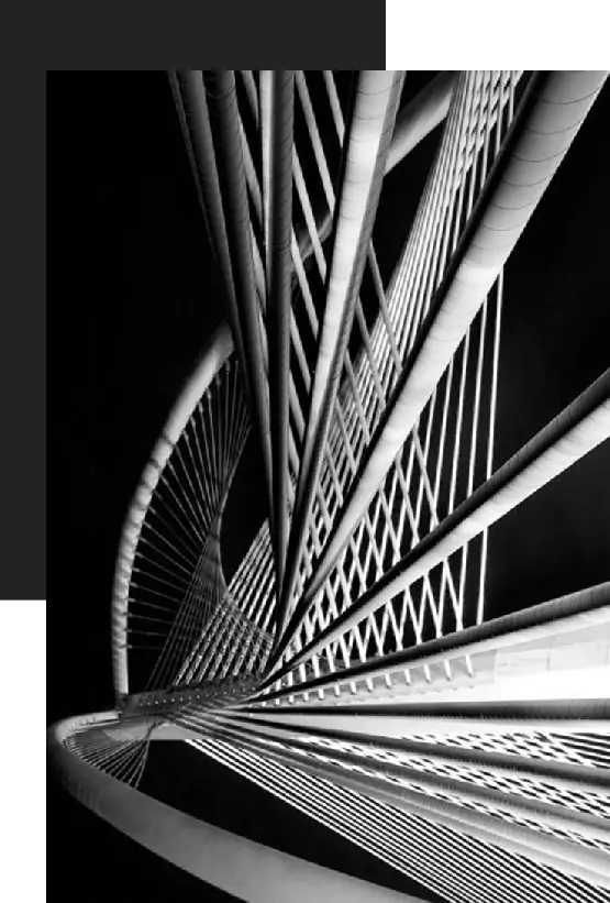 Abstract black and white photo of a spiral metal structure.